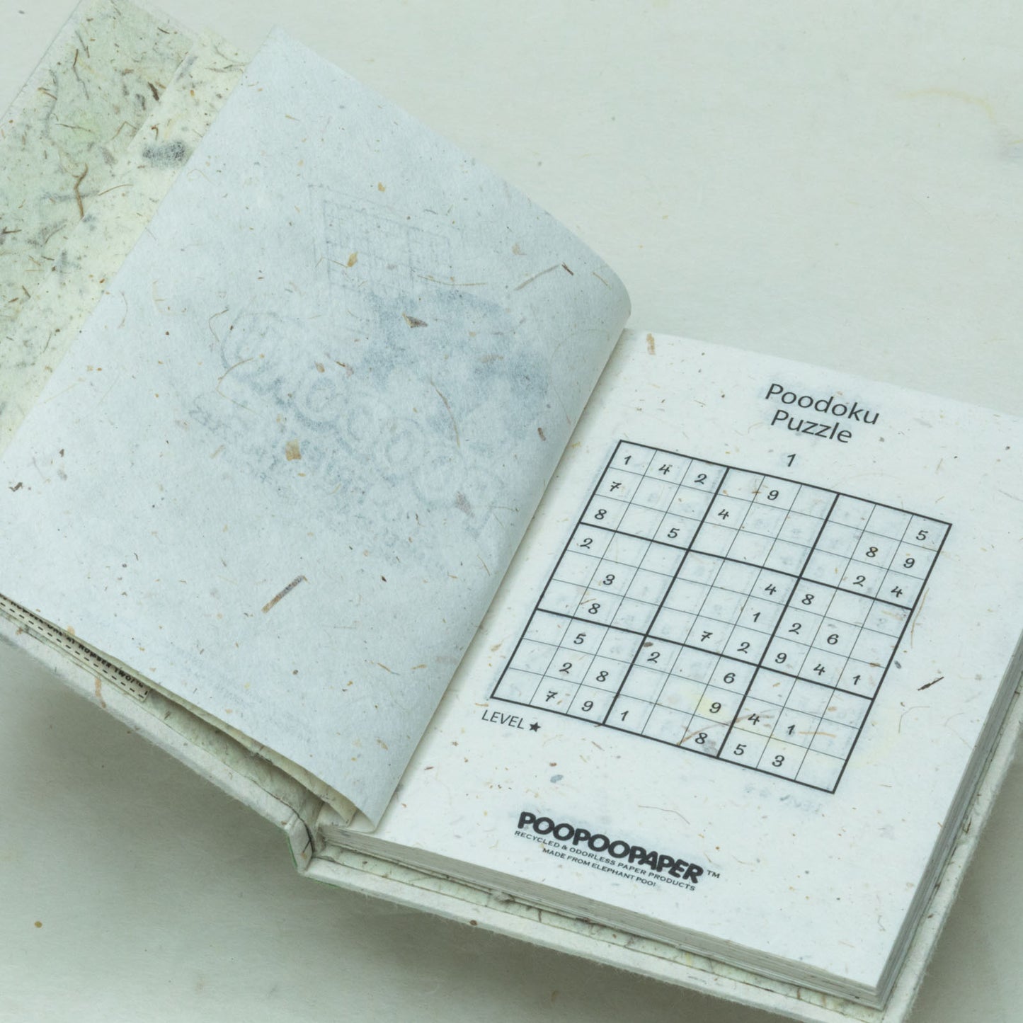 Poodoku - Three Volume Sudoku Number Placement Puzzle Set - Inside first page sustainable puzzles book 03