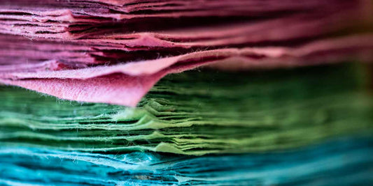 colored sheets of handmade paper